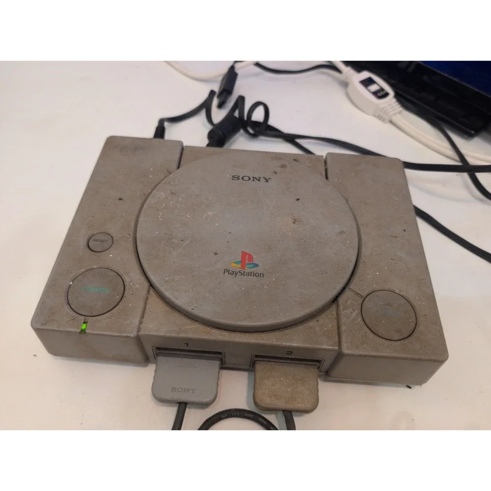 Sony PlayStation 1 Gray  System Tested Working Plus 2 Controllers 8 Games Cords